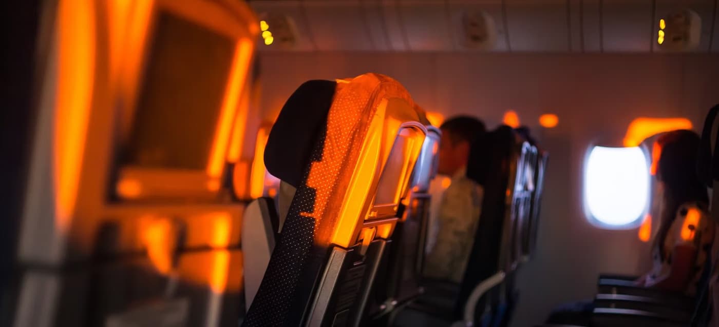 Tips tegen verveling in het vliegtuig
